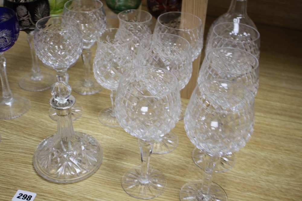 A set of six Royal Doulton cut glass goblets, 19cm, two pairs of goblets in a matching pattern, 18cm and 17cm, and a matching decanter,